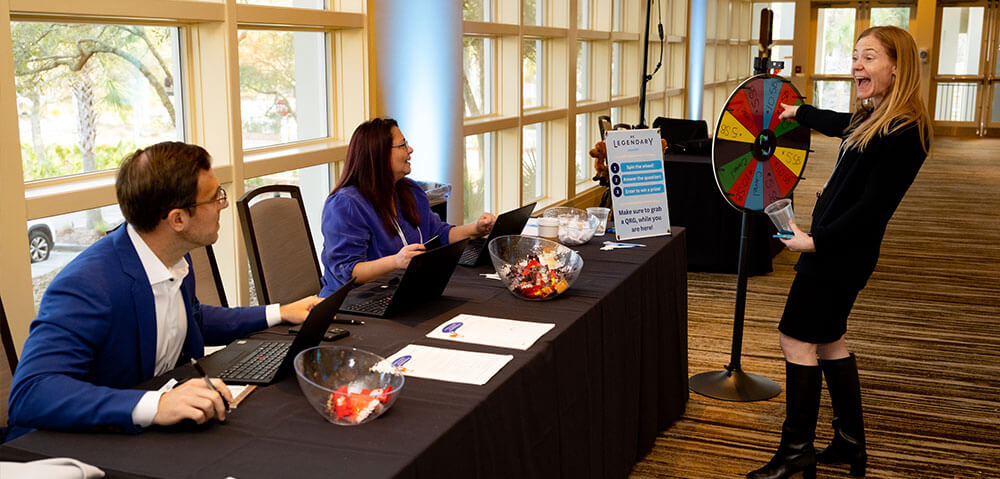 meetings-and-events-woman-happy-at-a-prizewheel