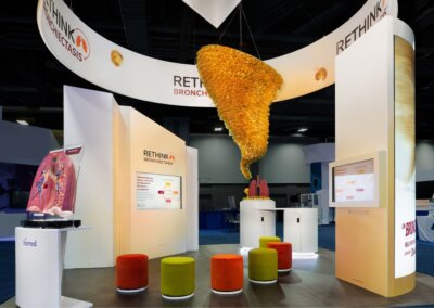 Insmed exhibit tornado created from heated and shaped plastic globes with 3D-printed pieces inside
