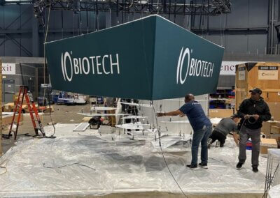 IO Biotech lifting the overhead sign