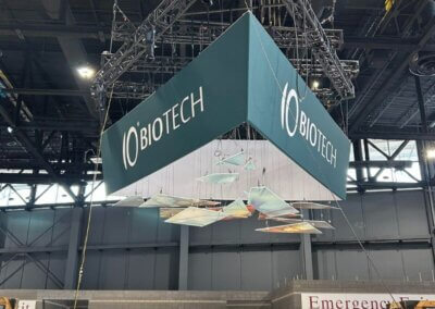 IO Biotech lifting the overhead sign