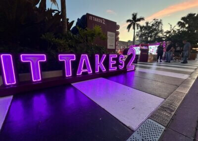 It Takes 2 illuminated sign
