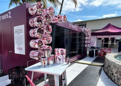 interactive pledge wall with boxes and spray cans